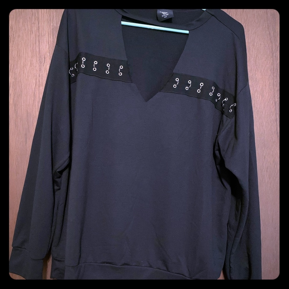 Sexy, low cleavage cut long sleeve shirt.